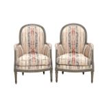 A set of two Louis XVI-style armchairs, England, 19th century. The curved back with vcarved