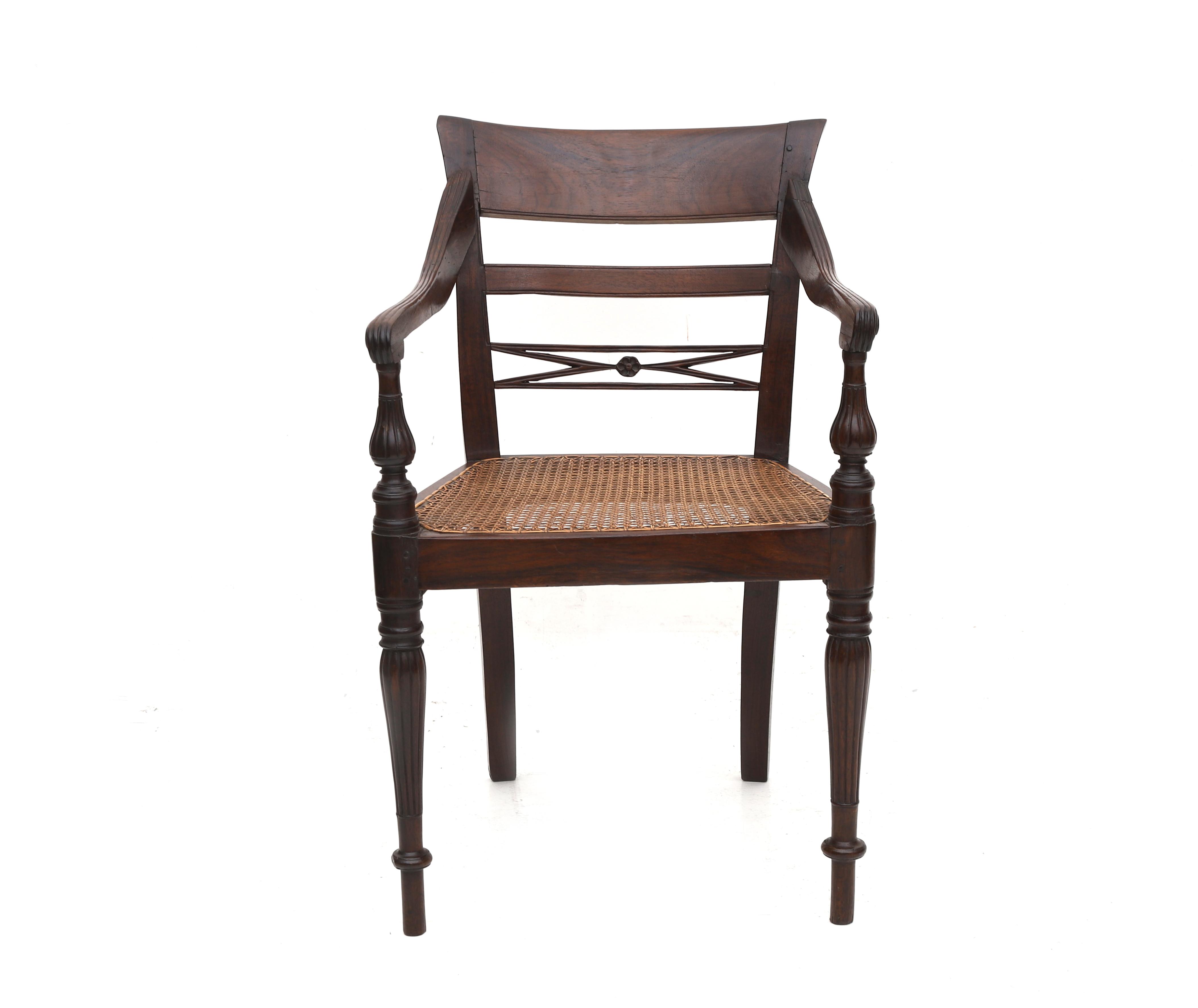 The open back with carved ornaments, webbing seat, armrests with carved details, four tapering - Image 2 of 3