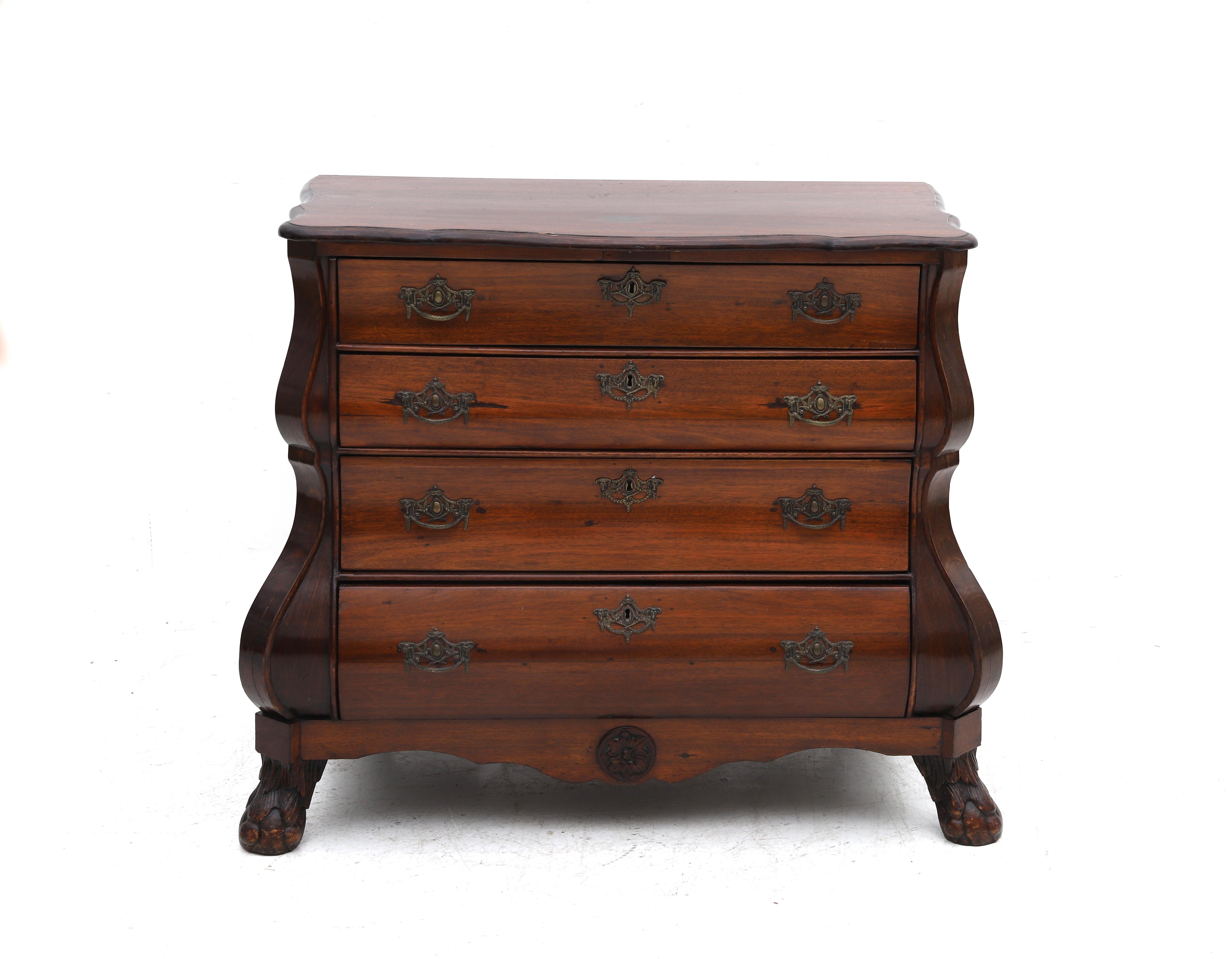 A Louis XV chest of drawers / commode, Dutch, 18th century. Under the scalloped top four drawers
