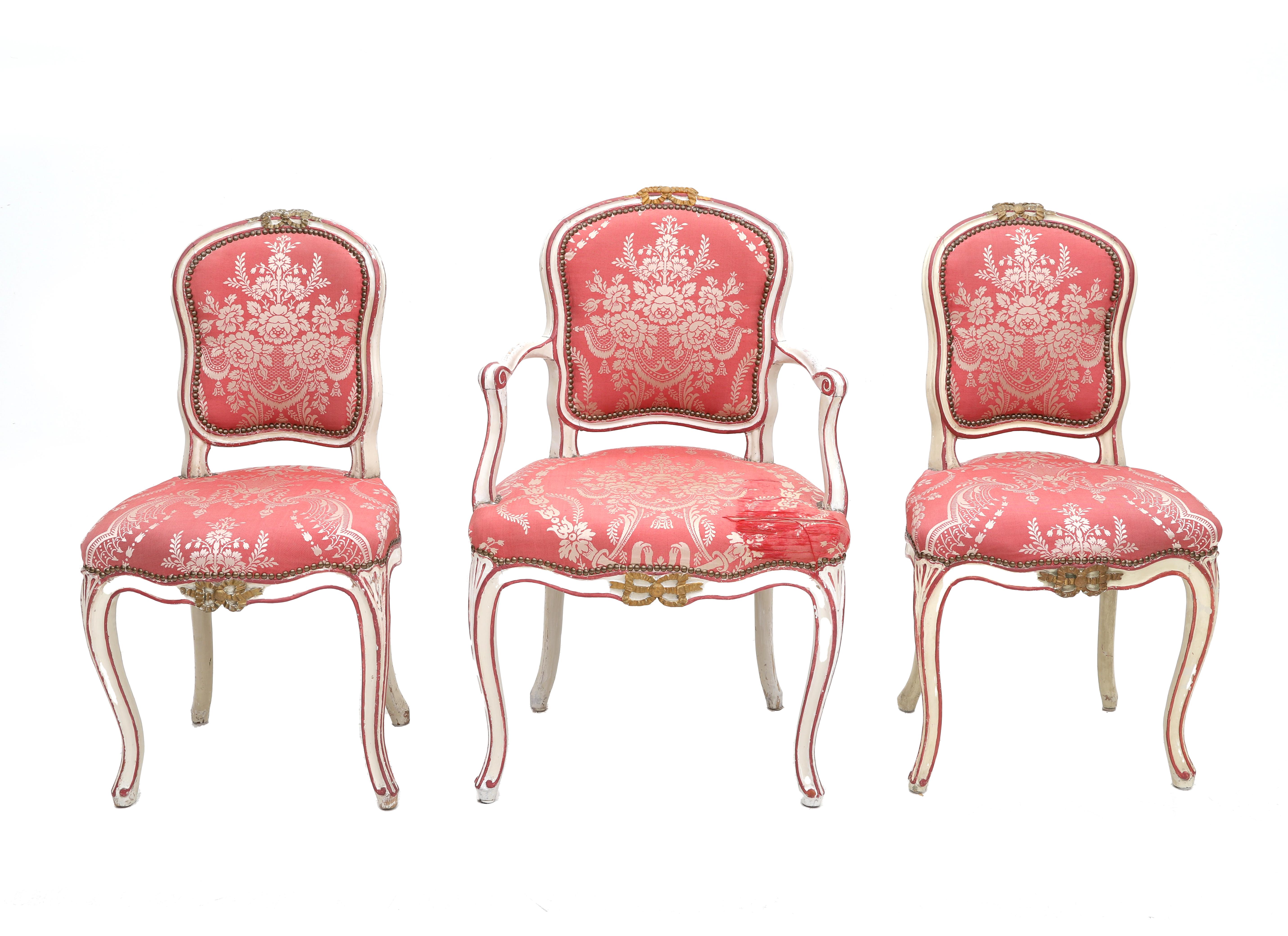 Three various Louis XV chairs, 18th century. Of which one with armrests, the scalloped back above