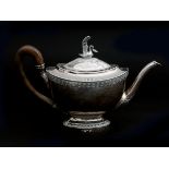 A silver Empire teakettle, Dutch, 19th century. On the lid a swan, surrounded by acanthus leafs and