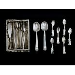 EA miniature silver part cutlery set in woven basket, Dutch,18th century and later. Six knifes,