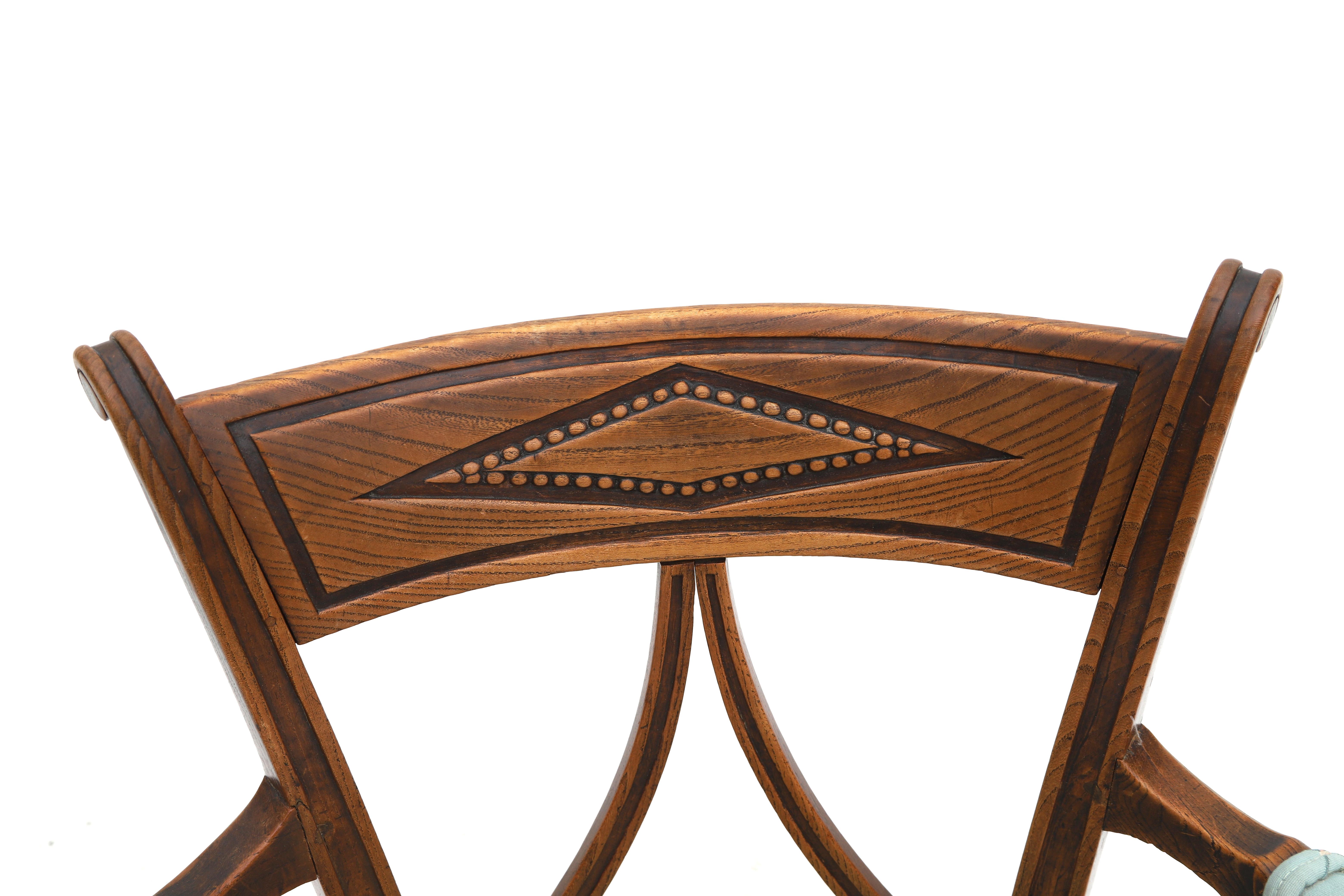 An elm wood armchair, Dutch, ca. 1800. With openworked backsplat, armrests, resting on four legs, - Image 4 of 4