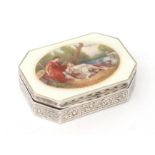 A silver tobacco box with enamelled lid, 19th century. Decorated with floral motif at the sides,