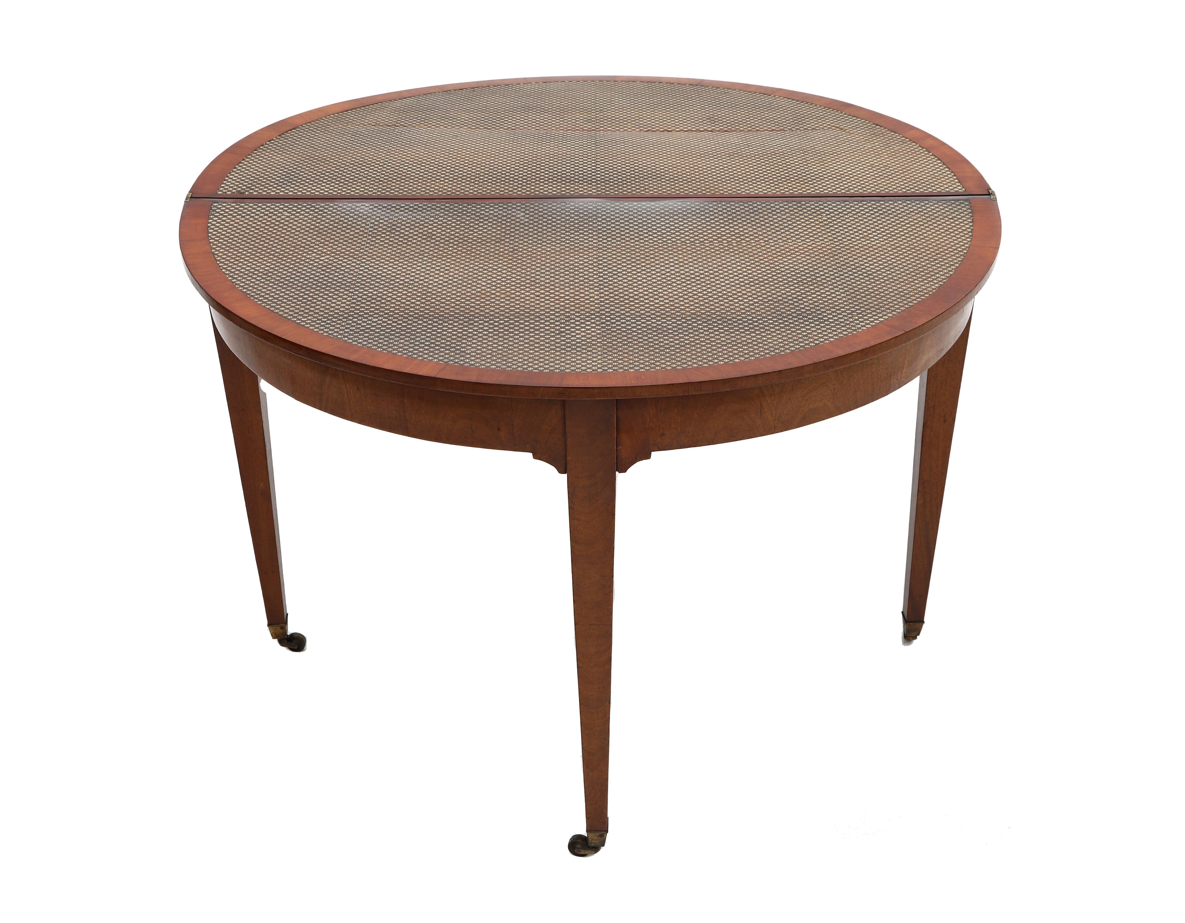 A mahogany demi-lune (crescent) table, Dutch, ca. 1800. The top in two halfs, extendable, resting - Image 2 of 6