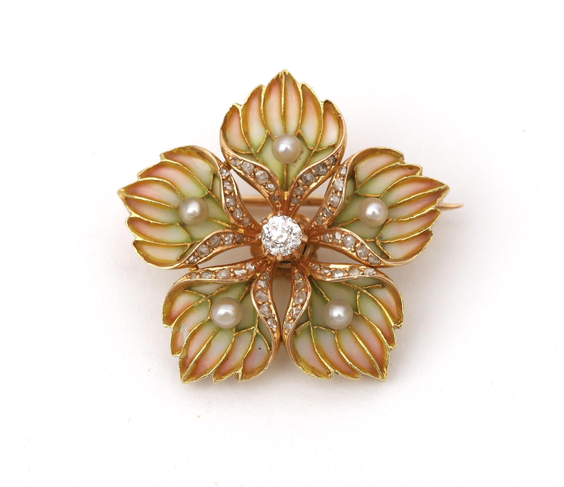 An 18 karat gold plique à jour diamond and pearl Art Nouveau flower brooch. Elaborated with green