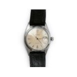 A steel Rolex Roulette wristwatch, ca. 1950-'57. Midsize model. Handwind, serie 43671, ref. 6494.