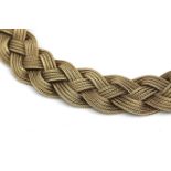 A 14 karat Gold braided necklace