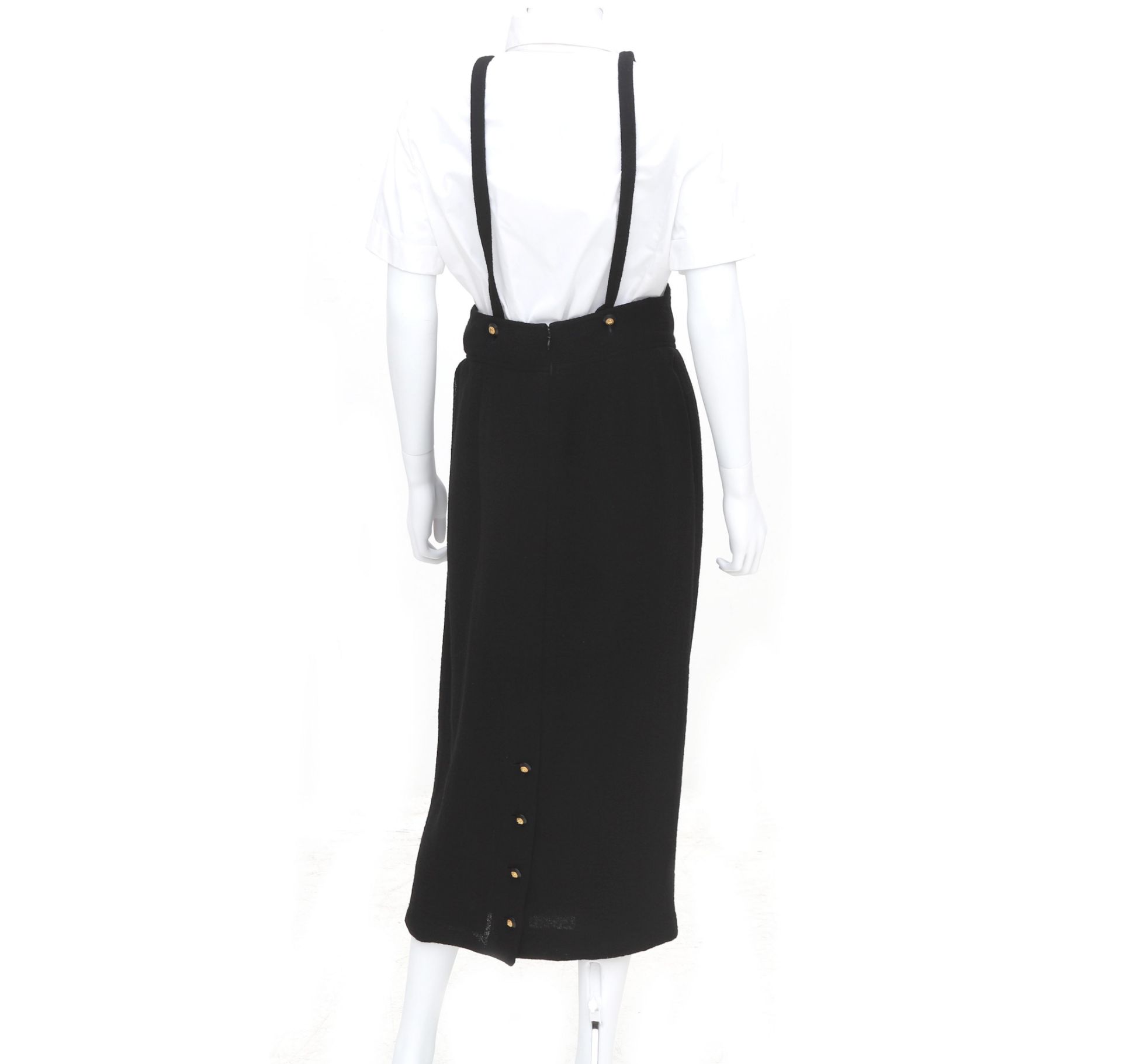 A black Chanel Boutique skirt with shoulder straps. The long skirt has two internal pockets on the - Bild 4 aus 6
