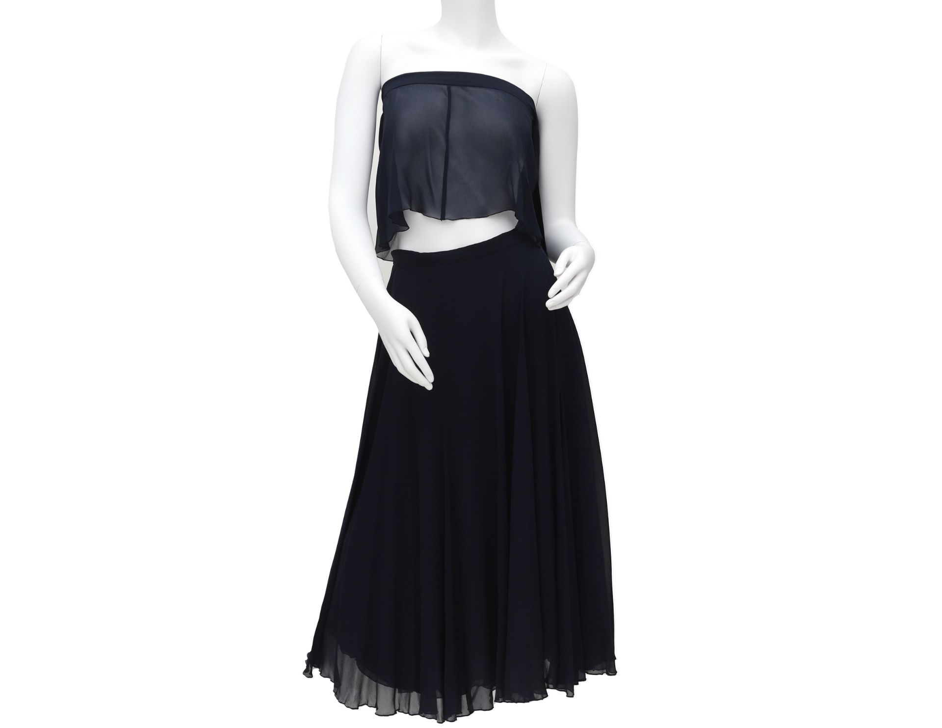 A Chanel Boutique navy blue ensemble with a bandeau top and long skirt. The skirt is a classic a-