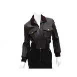 A Chanel Boutique leather bomber jacket with fabric collar. The jacket has two external pockets with
