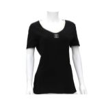 A Chanel Boutique t-shirt black with white details. The CC logo is embroidered on the front. Fabric: