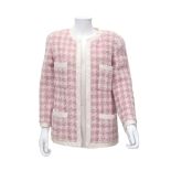 A soft pink Chanel Boutique checkered jacket. Incl. fabric sample. The jacket has four external
