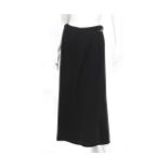 A black skirt from Hermès with belt detail. The long wool wrapover skirt has a belt at the taille.