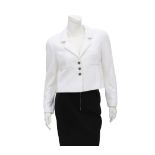 Chanel Boutique white jacket with a quilted pattern. The jacket has two external pockets, a