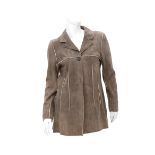 A Chanel Boutique suede jacket. The coat has a Chanel Paris button on the front and decorative
