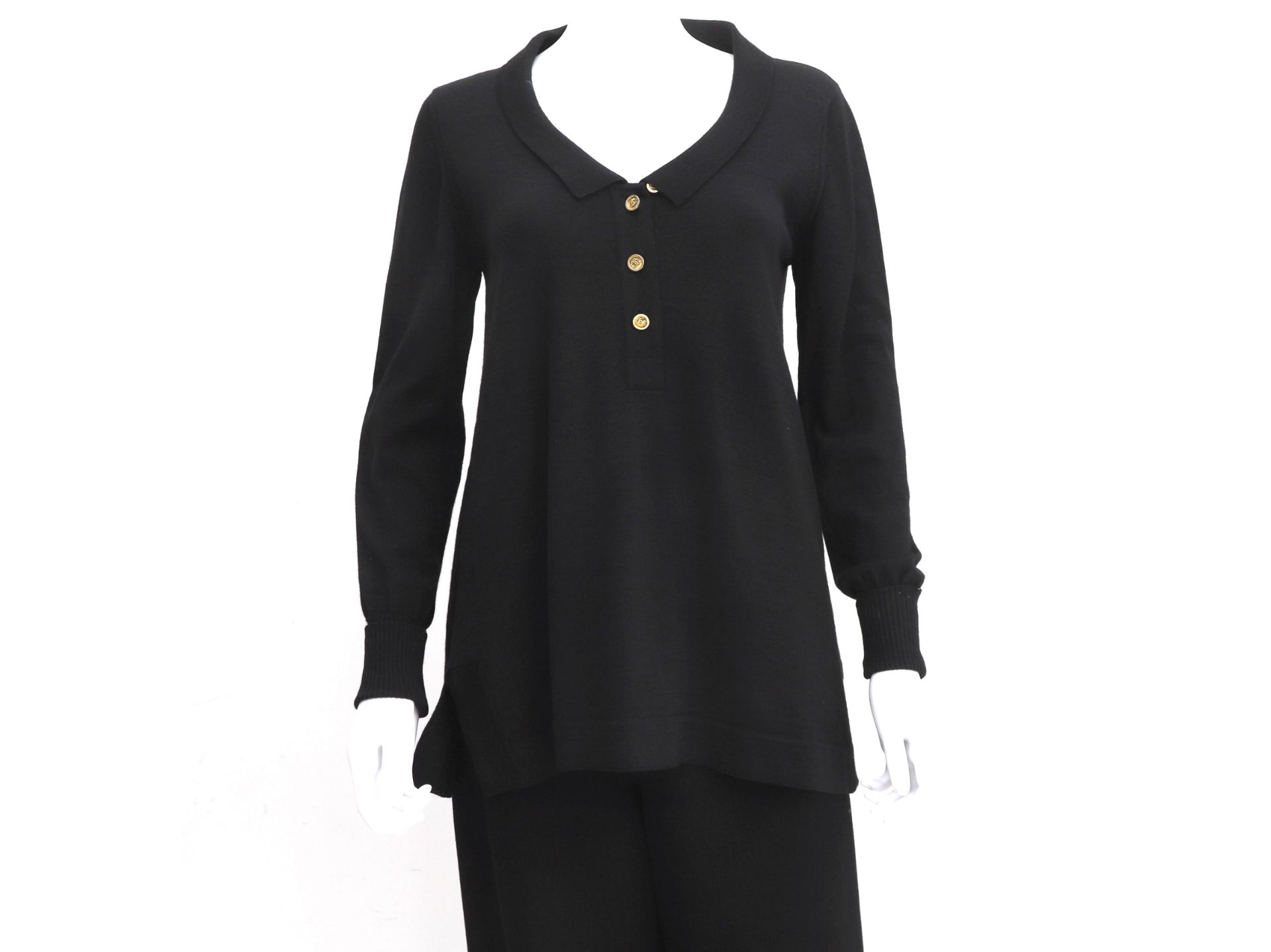 A Chanel Boutique black sweater, polo model. With three gold-coloured CC logo buttons on the