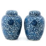 A Pair of Blue and White Jars with Covers