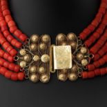 A 6 Strand Red Coral Necklace on Gold Clasp