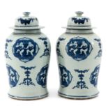 A Pair of 2 Blue and White Jars with Covers