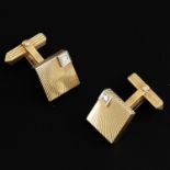 A Set of 14KG and Diamond Cuff Links