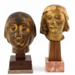 A Pair of Wood Busts on Marble Base