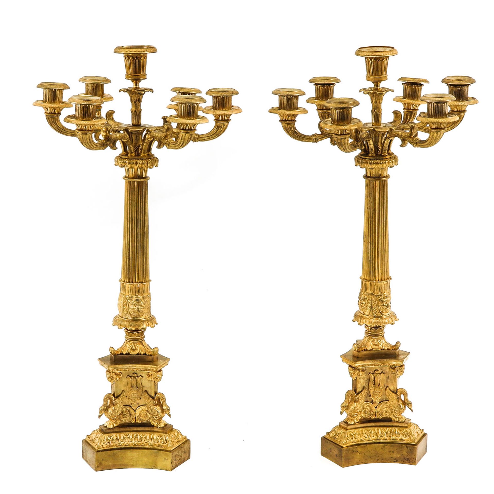 A Pair of 19th Century Gilded Candlesticks