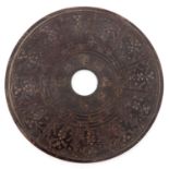 A Carved Bi Disk