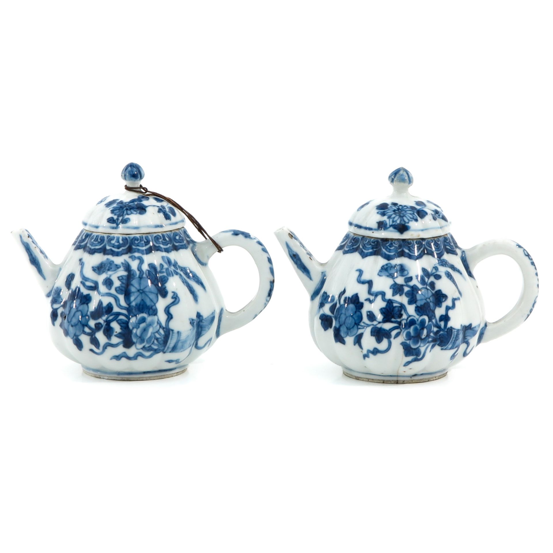 A Pair of Blue and White Teapots
