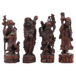 A Collection of 4 Carved Wood Sculptures