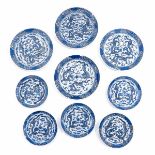 A Collection of 9 Blue and White Plates