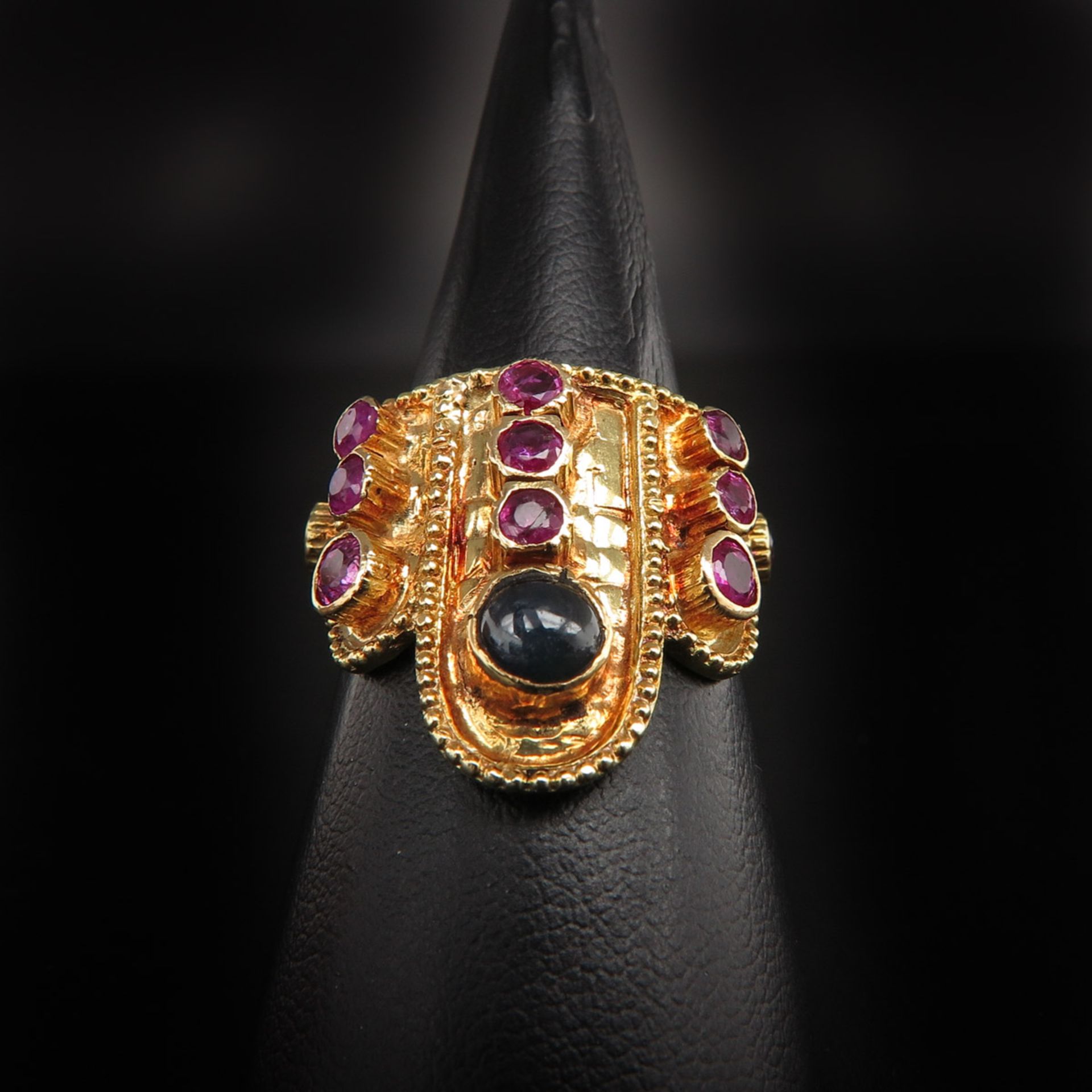 A Ladies 18KG Ruby and Saphire Ring