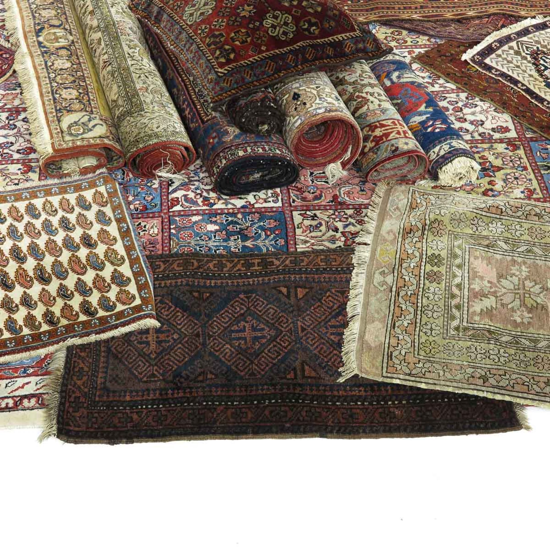 A Collection of 19 Carpets - Image 6 of 9