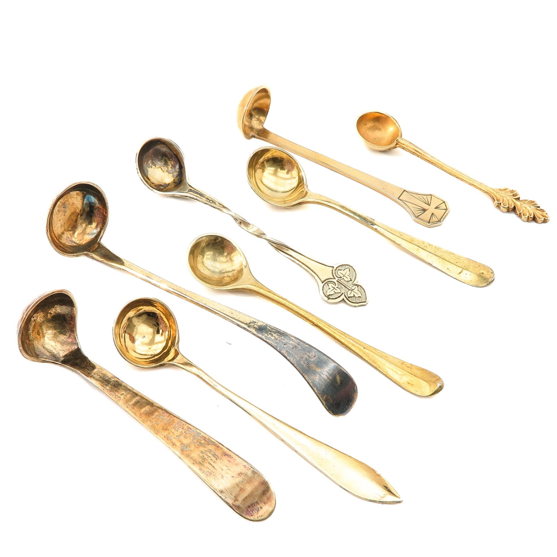 A Collection of 8 Religious Silver Spoons
