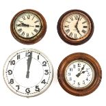 A Collection of 4 Electric Wall Clocks