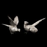 A Pair of Silver Bird Table Sculptures