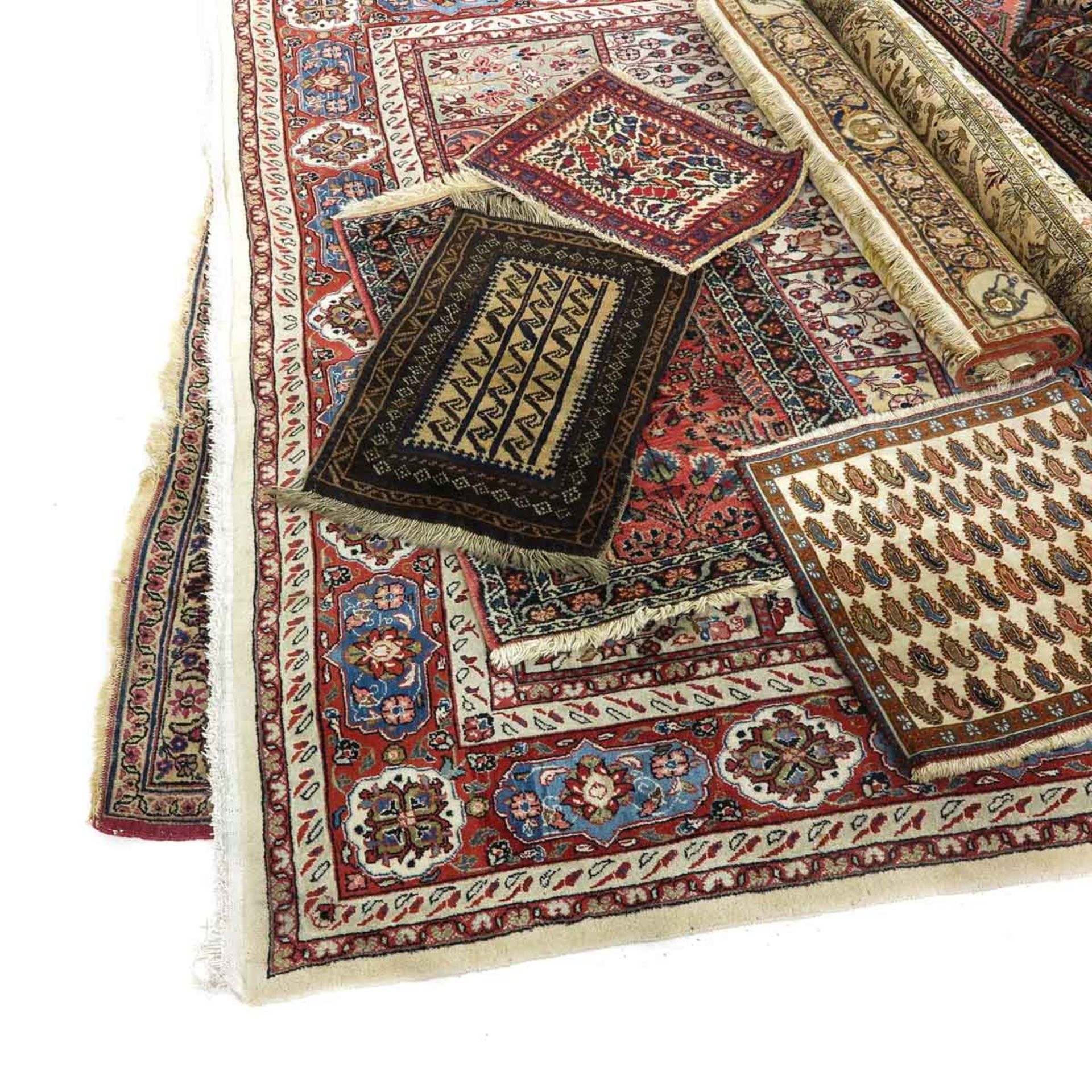 A Collection of 19 Carpets - Image 4 of 9