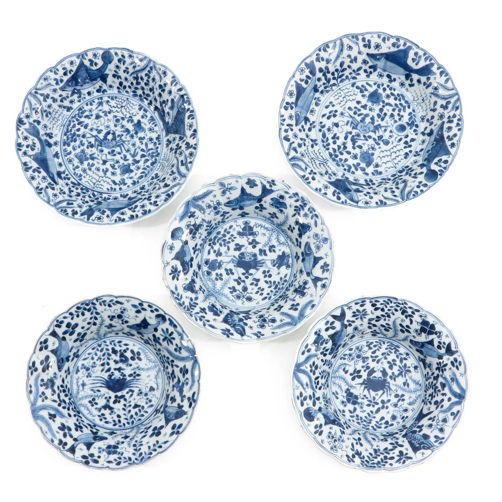 A Collection of 5 Blue and White Plates