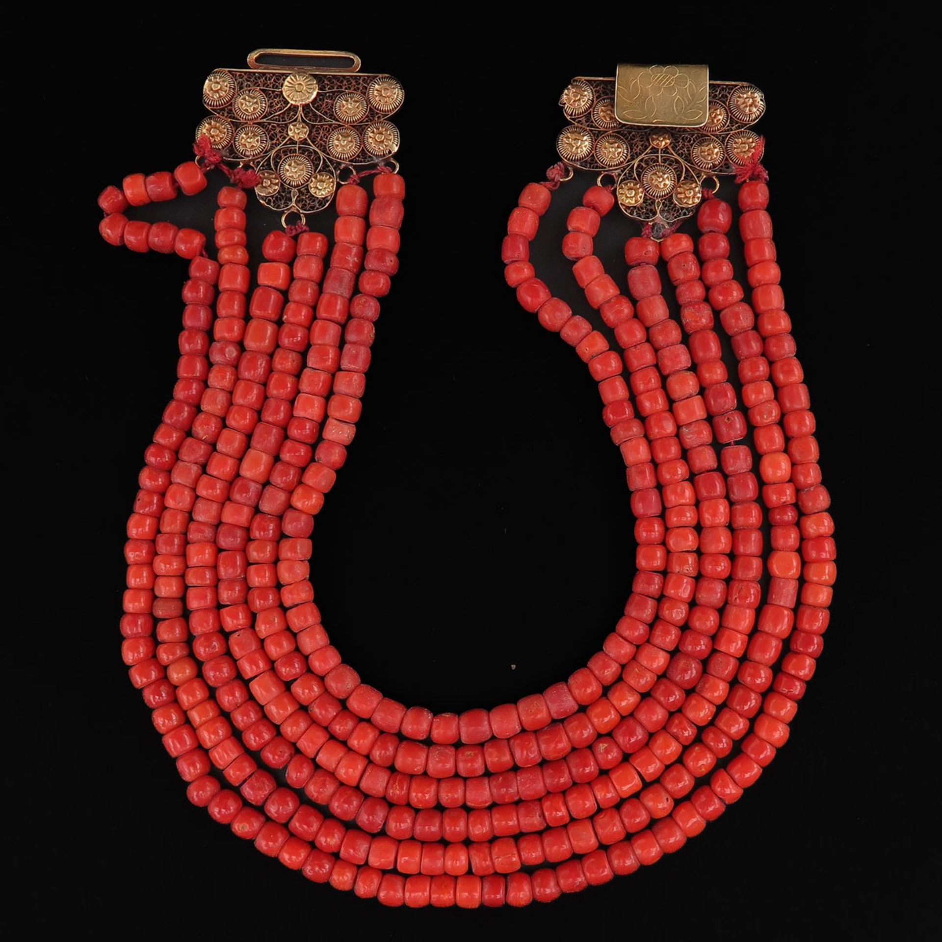 A 19th Century 6 Strand Red Coral Necklace on Gold Clasp