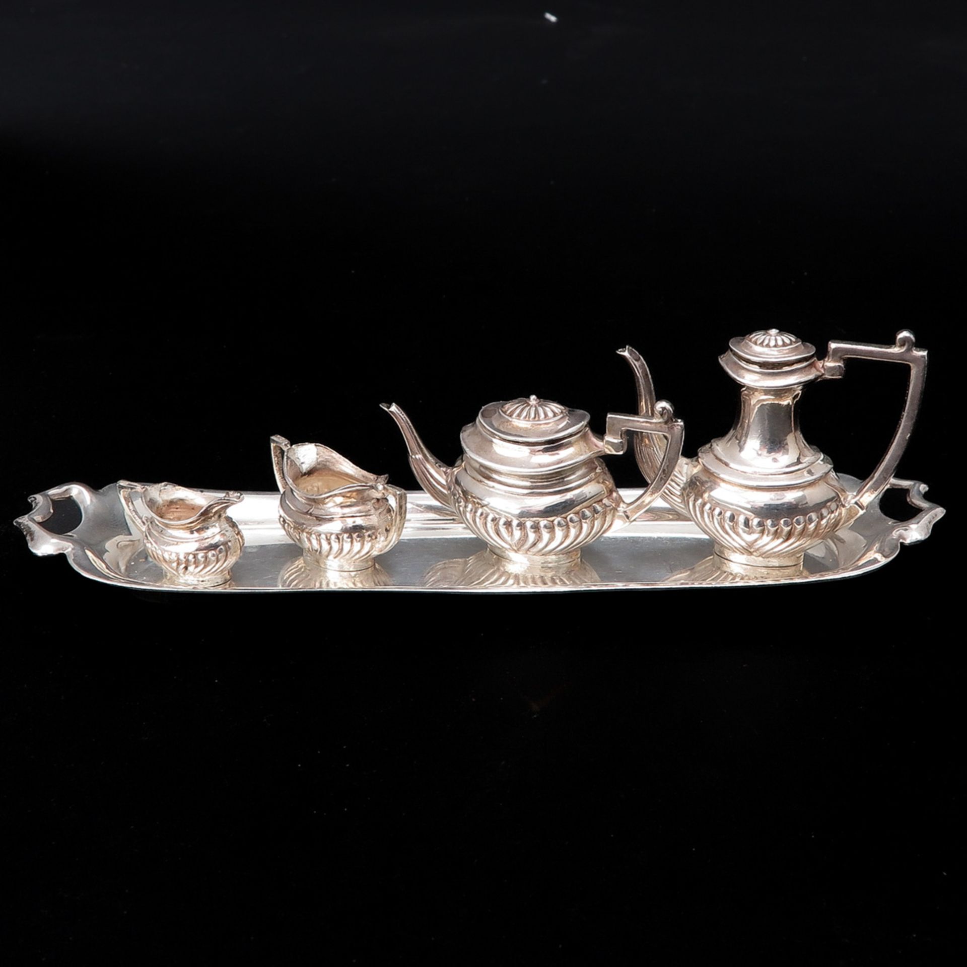 A Miniature English Silver Coffee and Tea Service