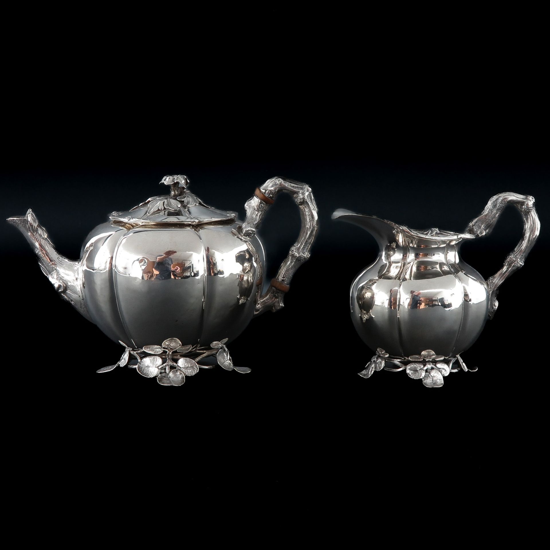 A Silver Coffee Pot and Creamer