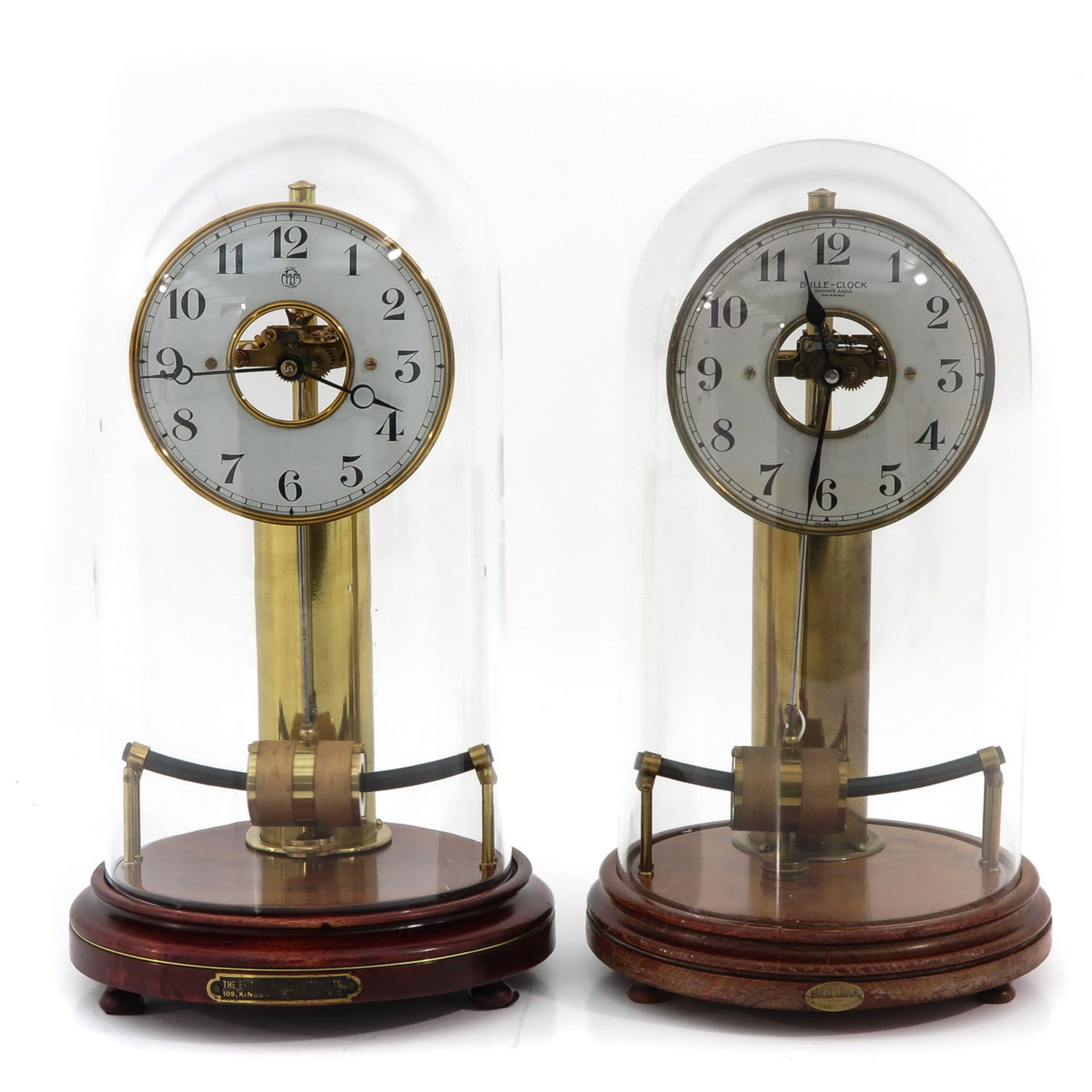 A Lot of 2 Electric Clocks Under Glass Domes
