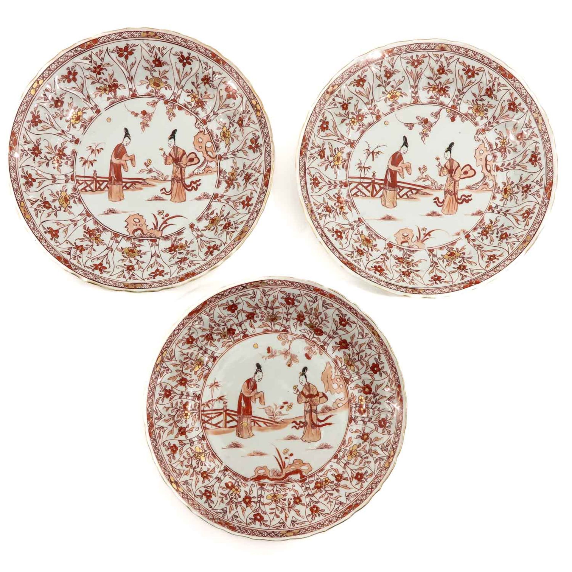 A Series of 3 Iron Red and Gilt Decorates Plates