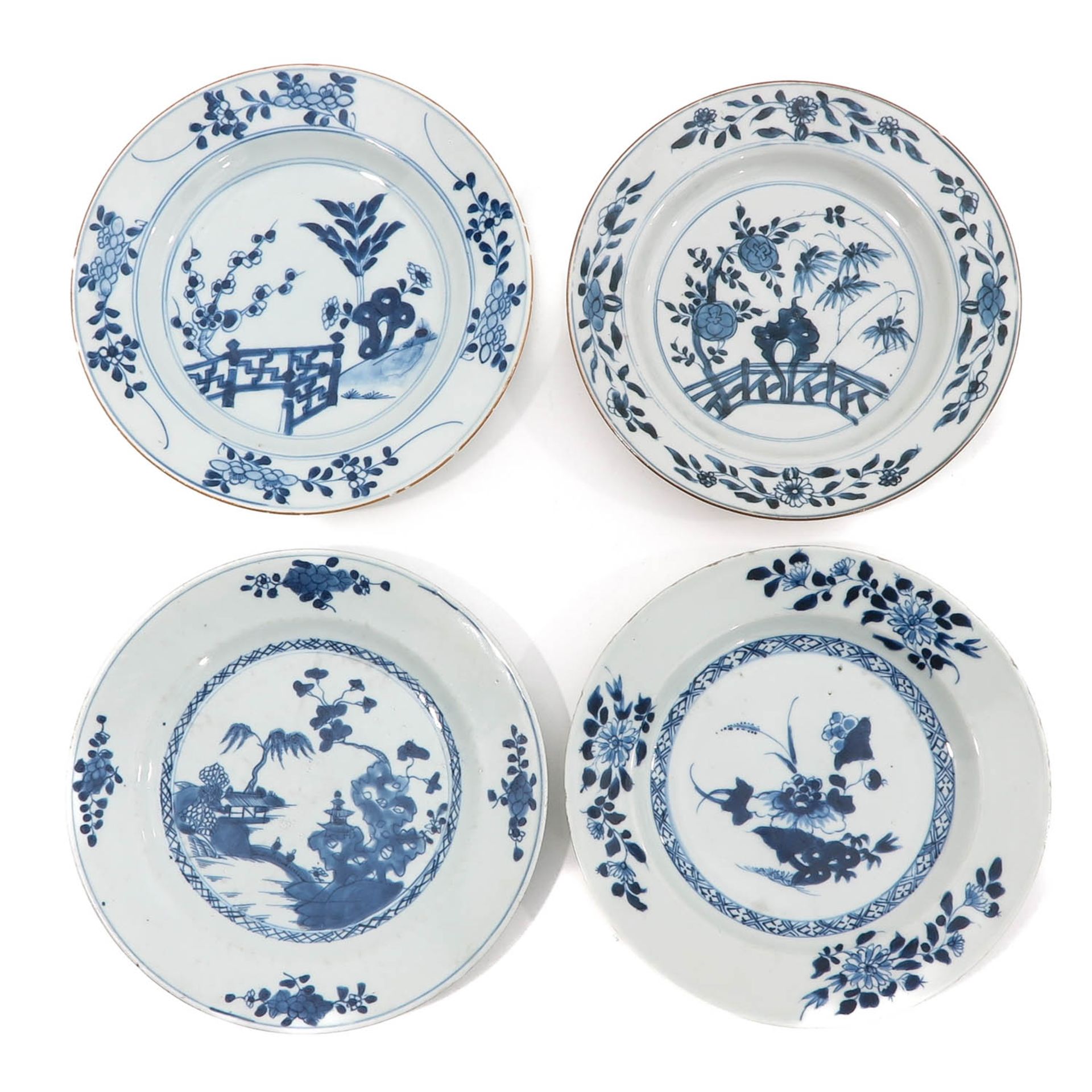 A Collection of 4 Blue and White Plates