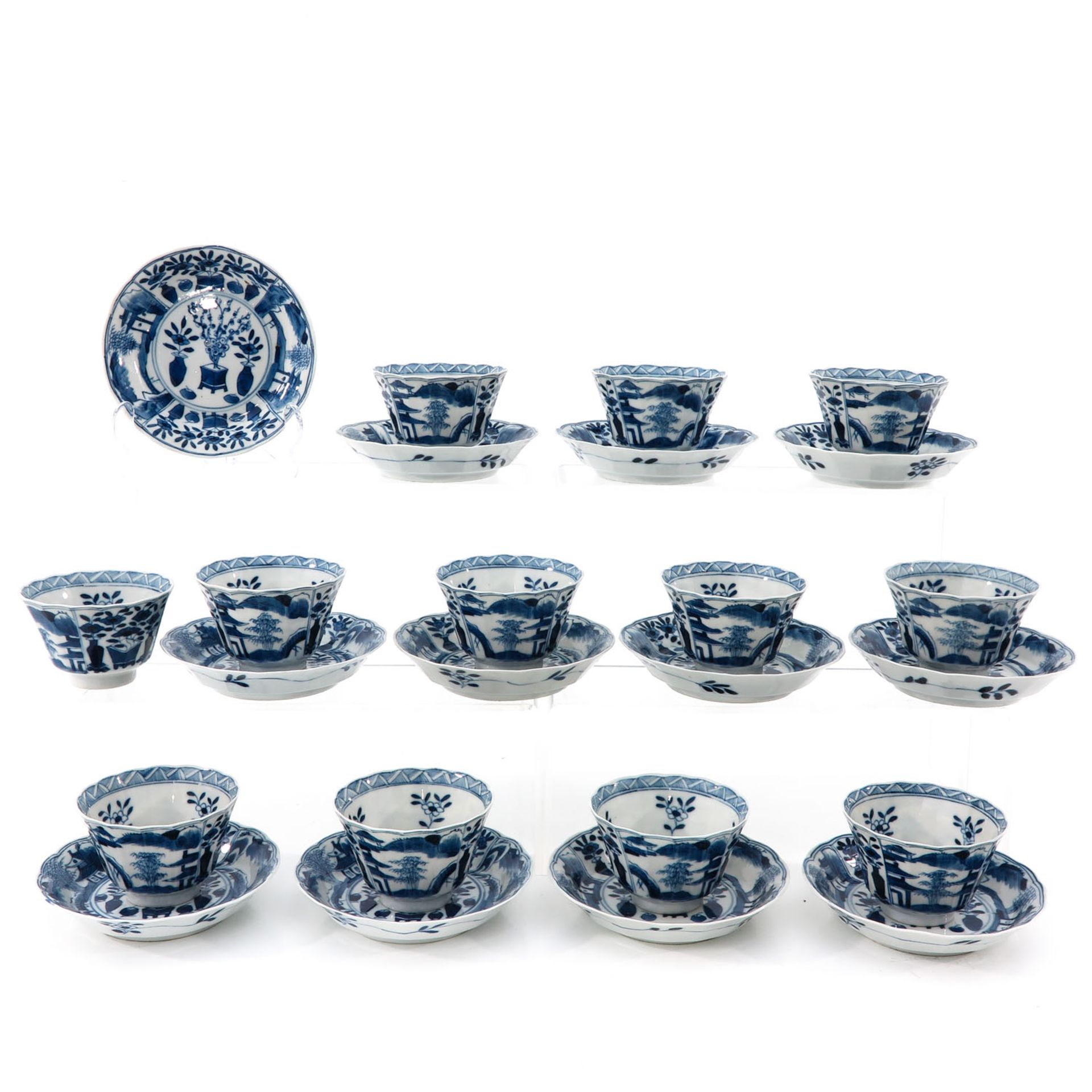 A Collection of 12 Cups and Saucers