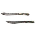 A Pair of Famille Noir Handle Knives