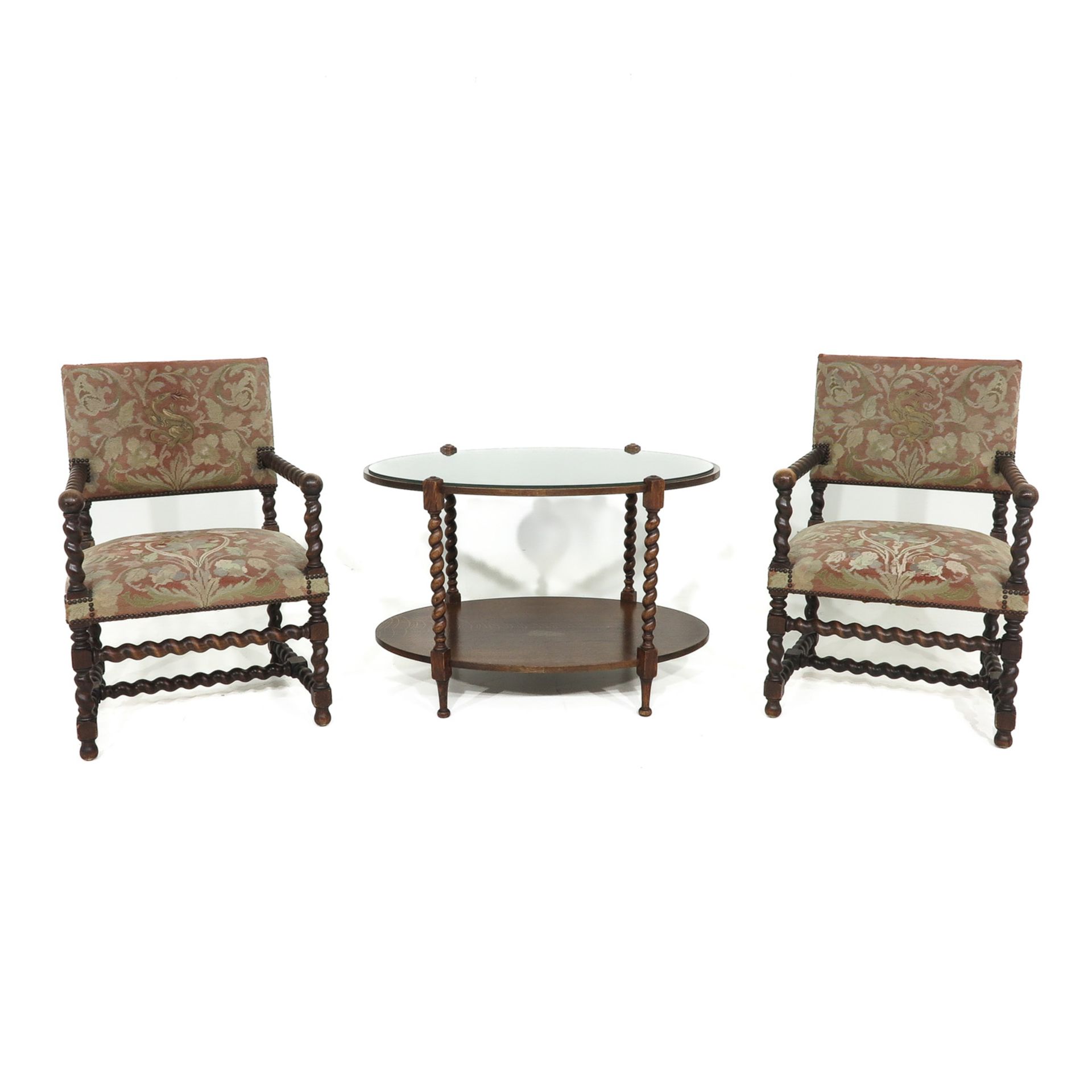 An Oak Coffee Table and 2 Tapestry Arm Chairs