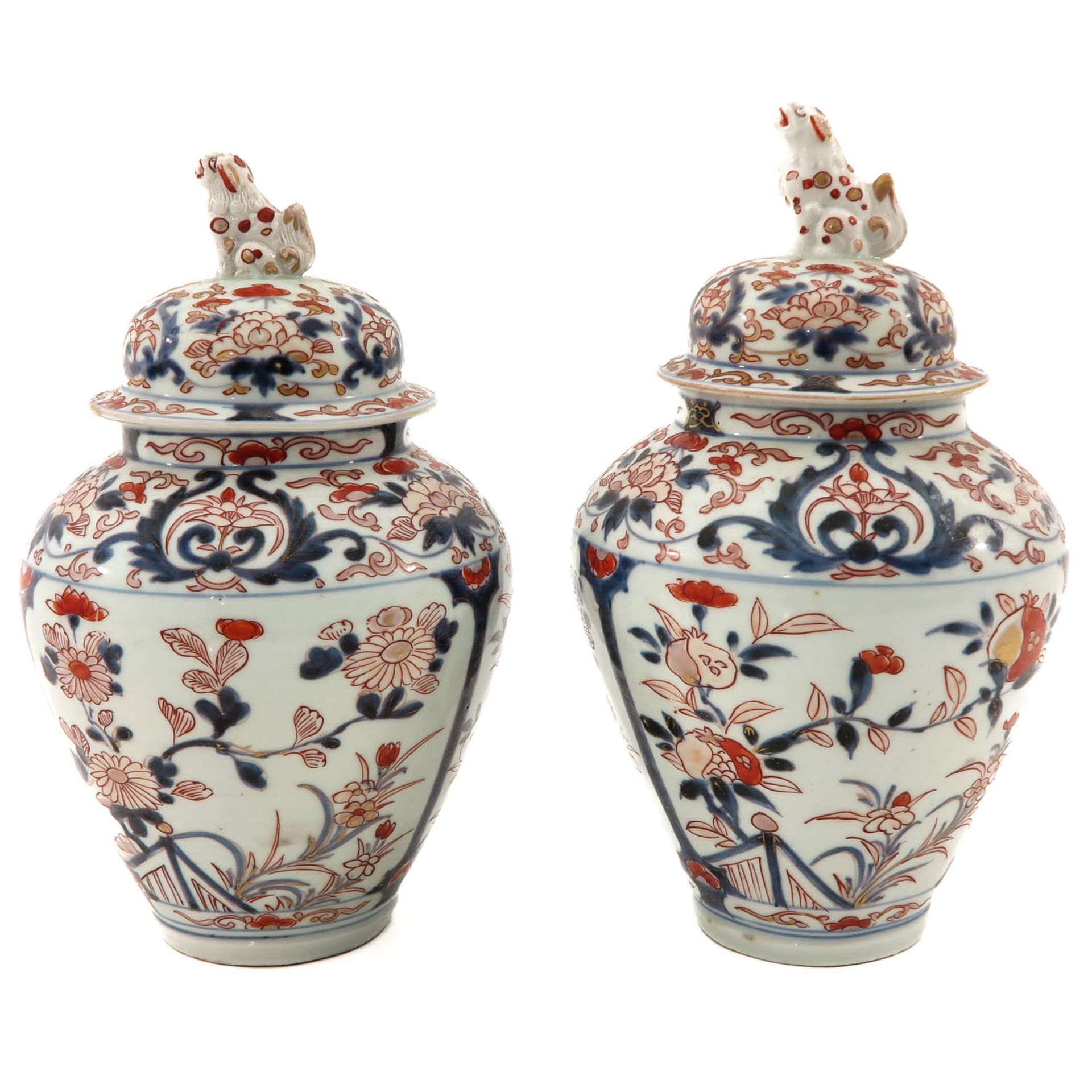 A Pair of Arita Jars with Covers