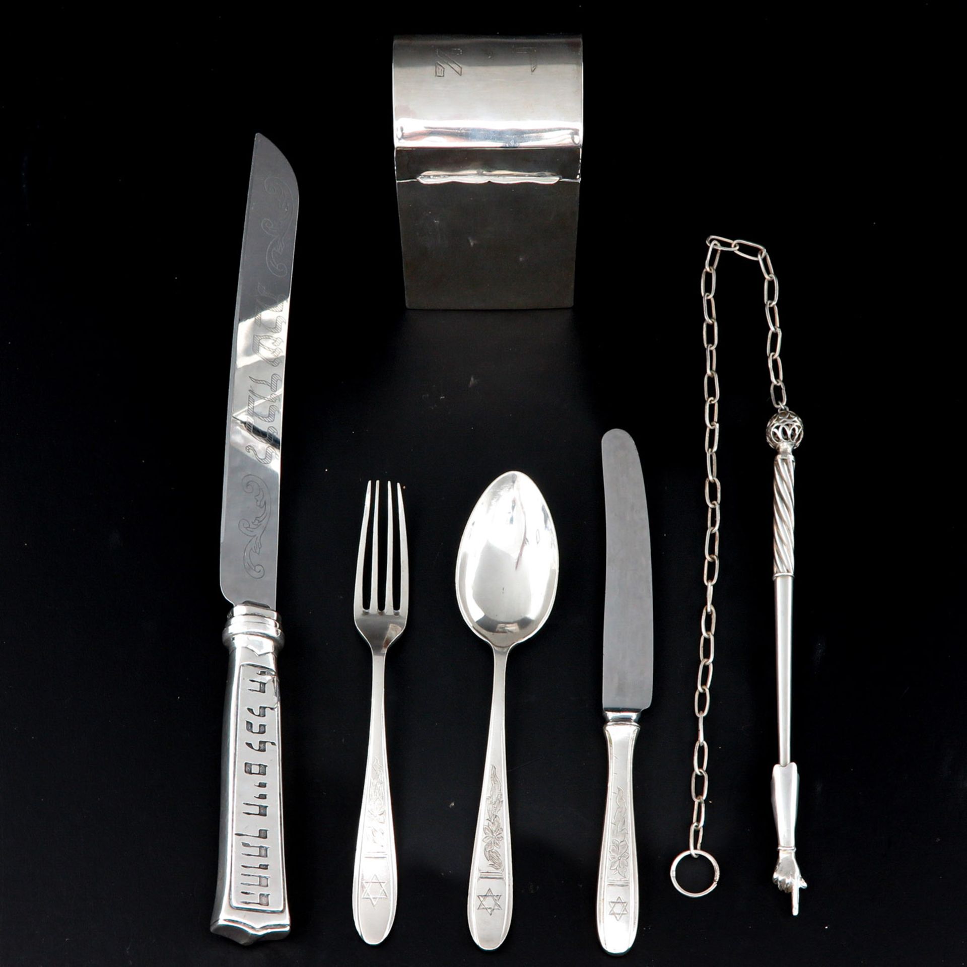 A Collection of Jewish Silver Items