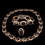 A 14KG Garnet Necklace, Bracelet, and Ring